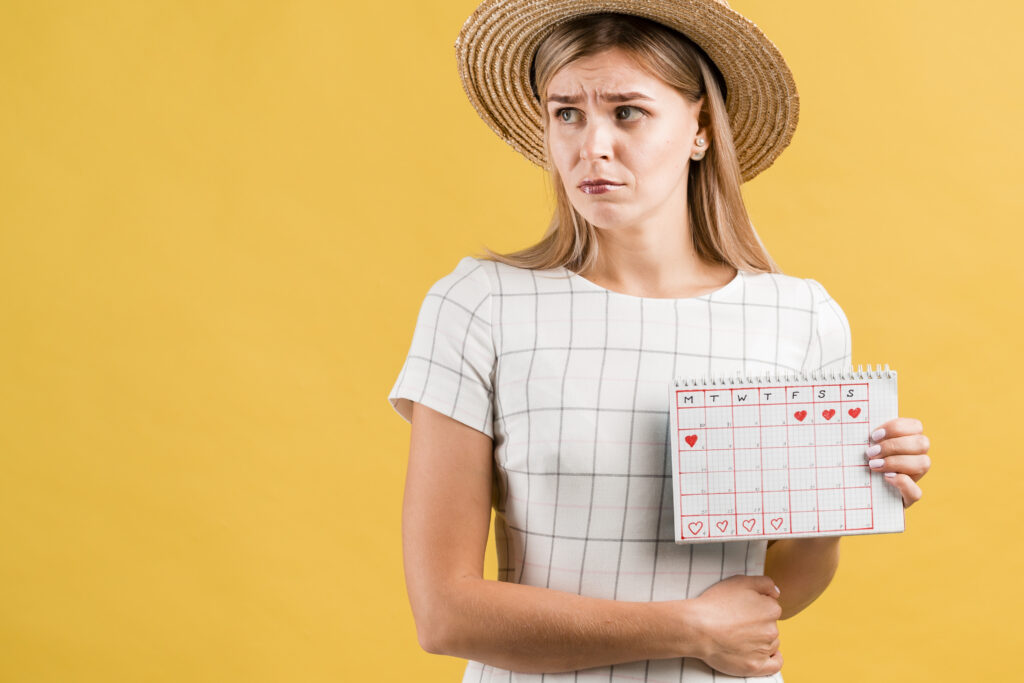 stomach cramps period calendar medium shot