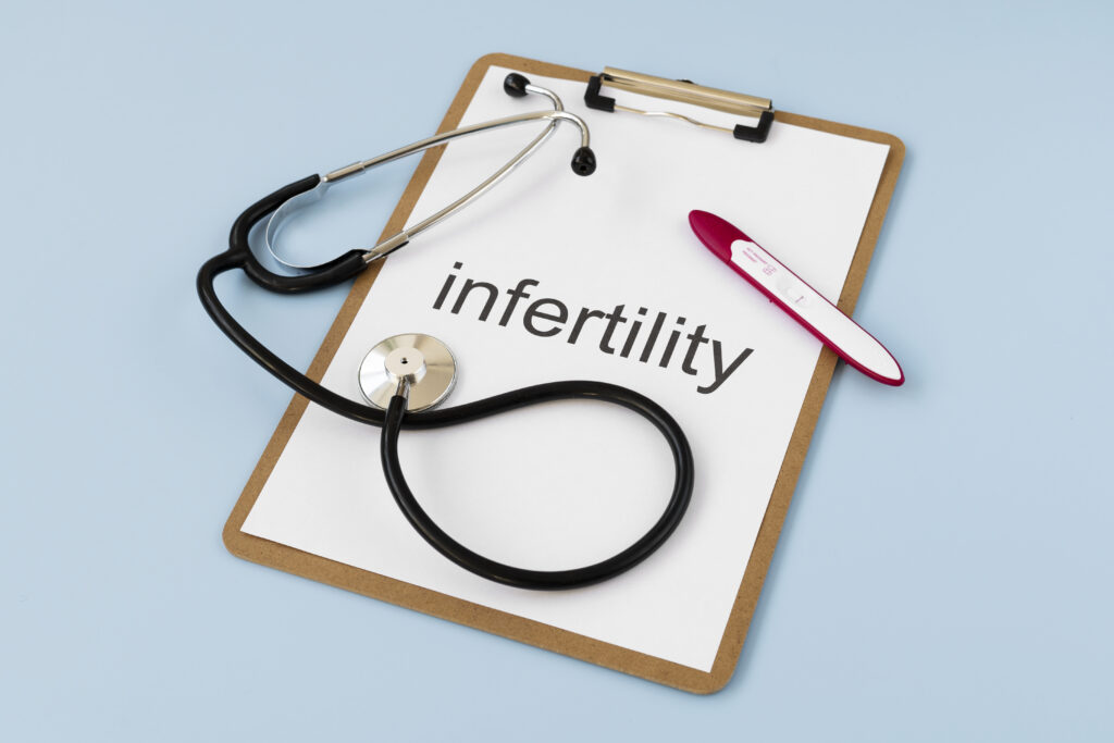 top view infertility word written paper